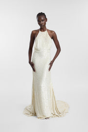 Mylo Gown in ivory with hand-beaded sequins, halter neckline, fitted silhouette and soft train